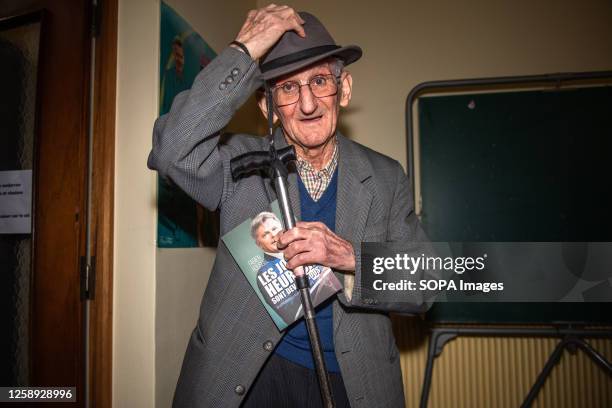 Joseph, a 90-year-old communist activist, holds his copy of the book written by Fabien Roussel. The book titled "Les jours heureux sont devant nous"...