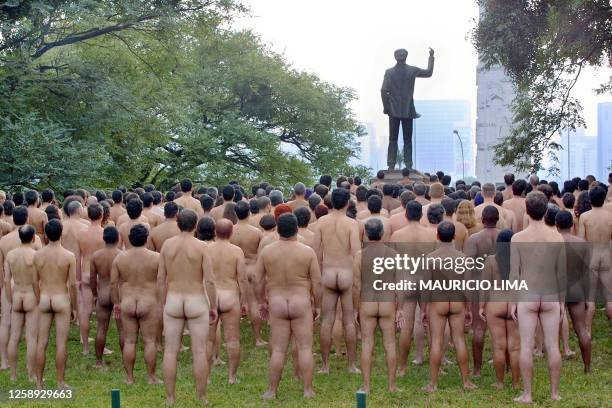 Group of naked people participate in one of US photographer Spencer Tunick's visual creations 27 April, 2002 in a park in Sao Paulo, Brazil. Some...