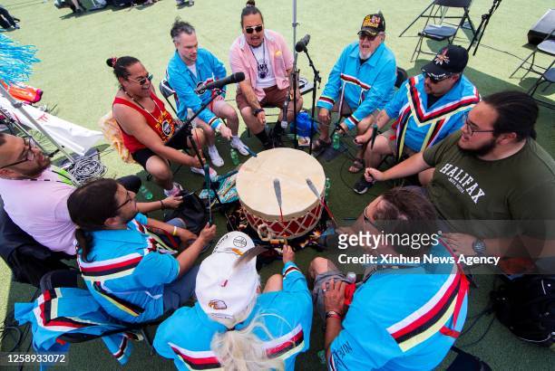 An indigenous band performs during an event marking National Indigenous Peoples Day in Mississauga, the Greater Toronto Area, Canada, on June 21,...