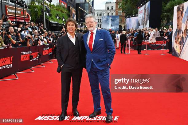 Tom Cruise and Christopher McQuarrie attend the UK Premiere of "Mission: Impossible - Dead Reckoning Part One" at Odeon Luxe Leicester Square on June...
