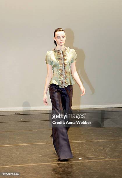 Model poses during the Yuna Yang Fall 2011 presentation during Mercedes-Benz Fashion Week at The Alvin Ailey Citigroup Theater on February 13, 2011...