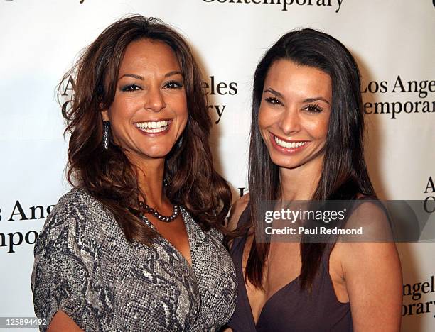 Actress Eva LaRue and her sister Lara LaRue arrive at Arts Los Angeles Contemporary Opening Night Reception at Barker Hangar on January 27, 2011 in...