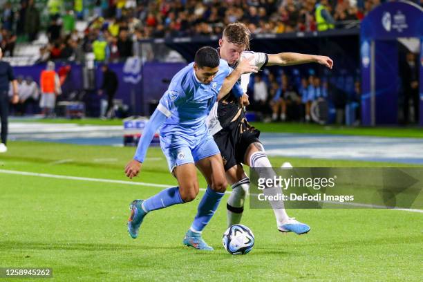 Anan Khalaili of Israel and Luca Netz of Germany battle for the ball during the UEFA Under-21 Euro 2023 match between Germany and Israel on June 22,...