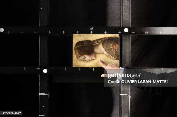 Replica of a portrait of a girl belonging to a private collector which may be a previously unrecognised work by Leonardo da Vinci, is seen on October...