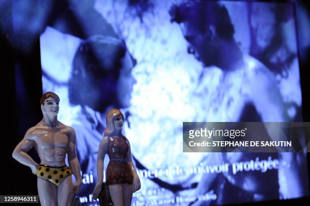 Photo taken on June 15, 2009 shows figurines presented during the exhibition "Tarzan" at the Quai Branly museum in Paris, held from June 16 to...