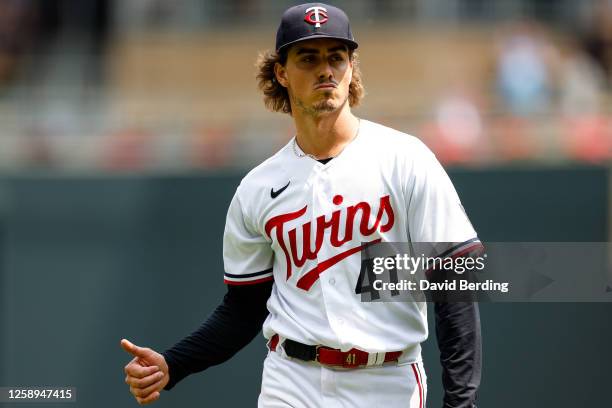 Joe Ryan of the Minnesota Twins celebrates recording a complete game shutout against the Boston Red Sox after the game at Target Field on June 22,...