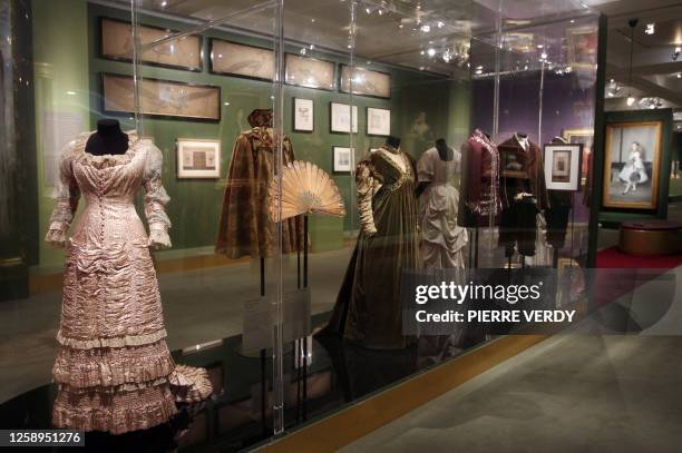Period clothes are displayed in a room of the Orsay museum in Paris on September 12, 2011 on the eve of the opening of the exhibition "Beauty, Morals...