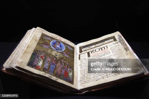 Book is displayed during the first "Coptic Art Revealed" exhibition in Cairo on December 8, 2010 where over 200 artifacts from the Coptic era are...