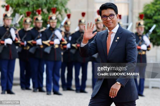 President of Madagascar Andry Rajoelina arrives for an official dinner at the Elysee Palace, on the sidelines of the New Global Financial Pact...