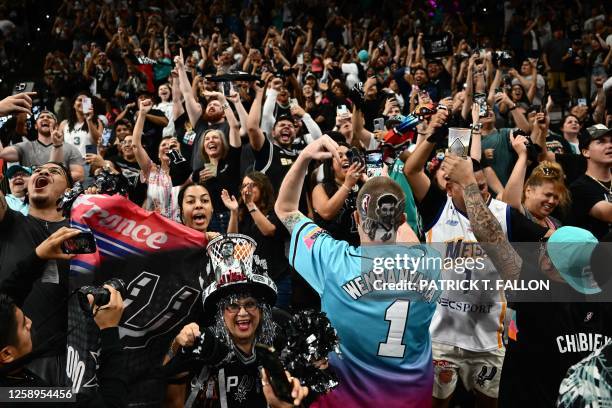 Fans cheer as Victor Wembanyama is selected as San Antonio Spurs's No. 1 pick during an NBA Draft Watch Party at the AT&T Center in San Antonio,...