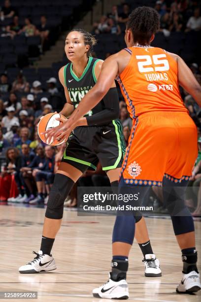 Napheesa Collier of the Minnesota Lynx looks to pass the ball during the game against the Connecticut Sun on June 22, 2023 at Target Center in...