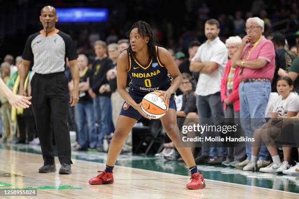 Kelsey Mitchell of the Indiana Fever handles the ball during the game against the Seattle Storm on June 22, 2023 at Climate Pledge Arena in Seattle,...