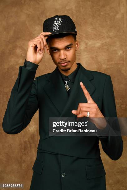 Victor Wembanyama poses for a portrait after being drafted number one overall by the San Antonio Spurs during the 2023 NBA Draft on June 22, 2023 at...