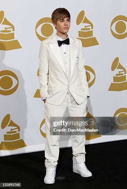 Justin Bieber poses in the press room at The 53rd Annual GRAMMY Awards held at Staples Center on February 13, 2011 in Los Angeles, California.