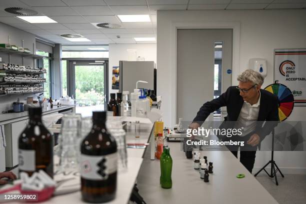 Mark Millward, head of UK flavor creation at Archer-Daniels-Midland Co., mixes a flavor sample at the ADM Innovation Food Lab in Manchester, UK, on...