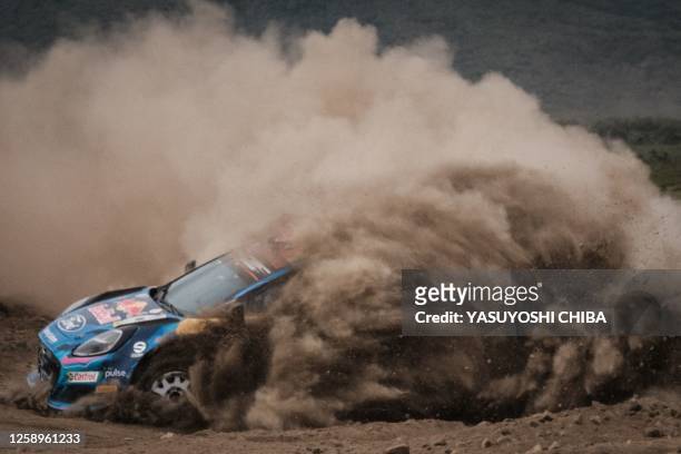 Greece's Jourdan Serderidis and co-driver France's Andy Malfoy steer their Ford Puma Rally1 Hybrid during the WRC Safari Rally Kenya, part of the FIA...