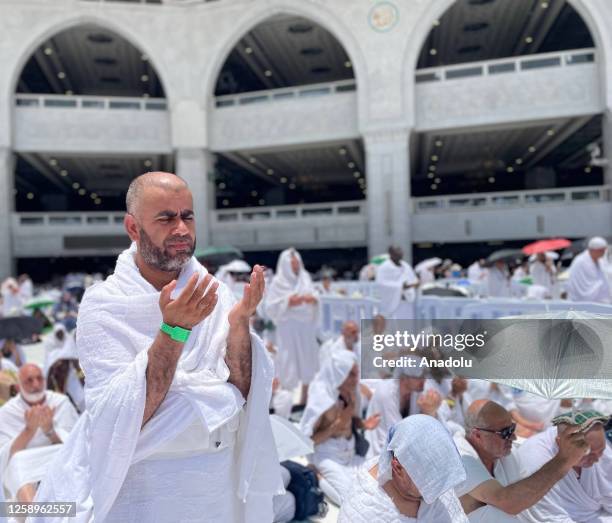 Prospective pilgrims perform prayer at the Masjid al-Haram during their Hajj pilgrimage in Mecca, Saudi Arabia on June 23, 2023.