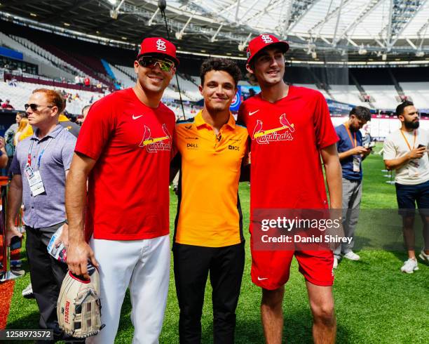 Dylan Carlson of the St. Louis Cardinals and Lando Norris of McLaren Racing during the 2023 London Series Workout Day at London Stadium on Friday,...