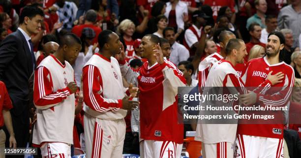 The Houston Rockets bench react near the end of the fourth quarter in Game 6 of the NBA Western Conference semifinal basketball playoff game against...