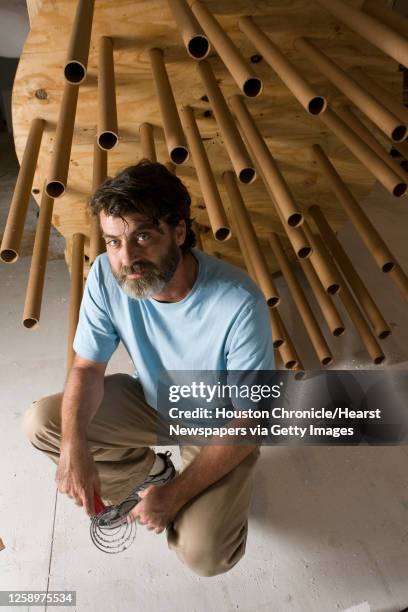 Artist Wayne White poses for a portrait at Rice Gallery Friday, Aug. 21 Houston. White, who is well known in the 1980s for his work designing puppets...