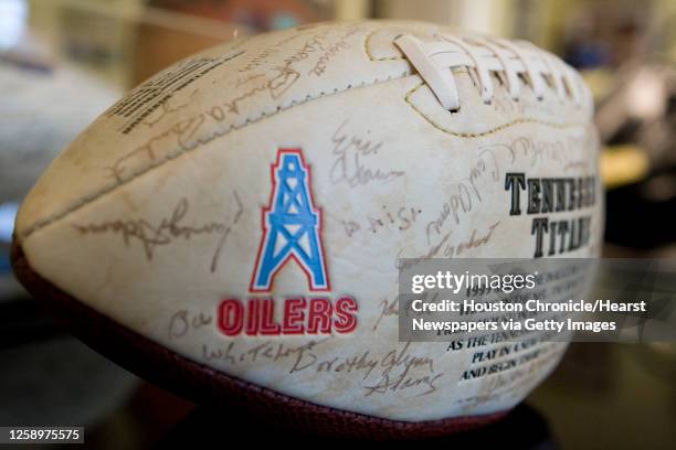 An Oilers logo adorns a Tennessee Titans autographed football from 1999 at team owner Bud Adams' home Thursday, July 30 Houston.