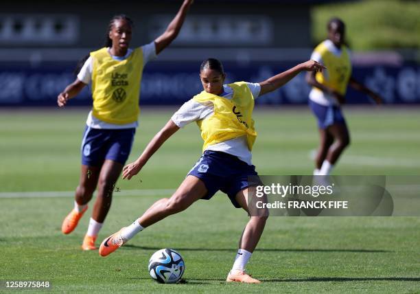 France's defender Estelle Cascarino kicks the ball during a training session in Clairefontaine-en-Yvelines on June 23, 2023 as part of the team's...