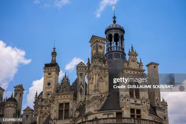 Photograph taken on June 16, 2023 shows restored lanterns of the Chambord castle, in Chambord, Central France. The work which started in May 2021...