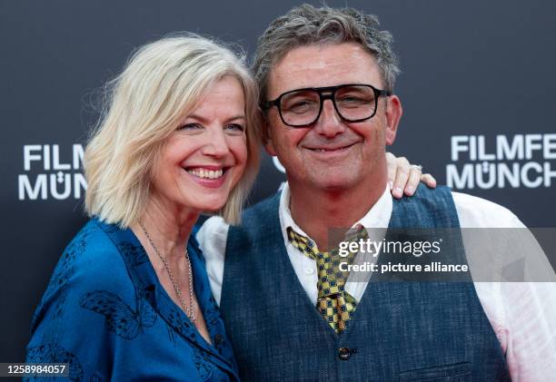 June 2023, Bavaria, Munich: Hans Sigl, actor, and his wife Susanne arrive at the Gasteig HP8 for the opening of the Munich Film Festival. The film...