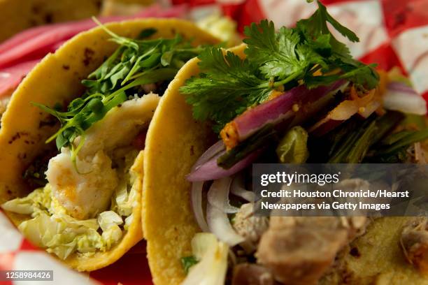 The snapper, pork belly and carnitas tacos are shown at El Gran Malo restaurant Tuesday, Oct. 25 in Houston.