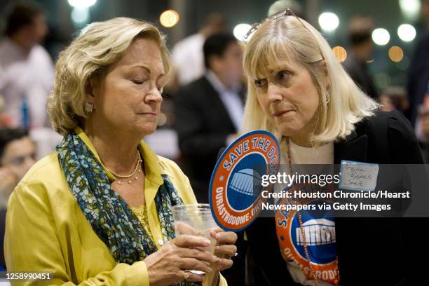 Astrodome renovation supporter Sally Allen, of Kingwood, left, talks to Regina Pappas Seale during an election watch party at Reliant Center Tuesday,...