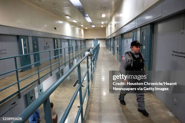 Lt. Phillip Ojeda walks through the K Bock administrative segregation wing of the Estelle Unit Wednesday, March 5 in Huntsville, Texas. During the...