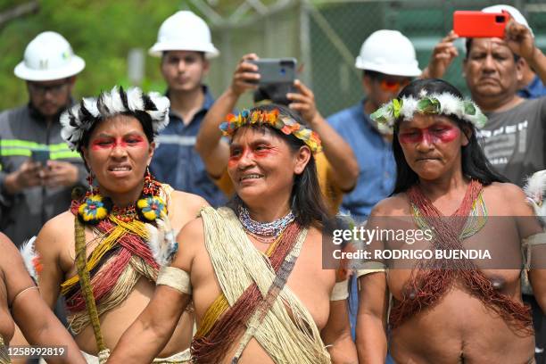 Indigenous Waorani people from the Kawymeno community are pictured in the Yasuni National Park during a demonstration in favor of oil exploitation by...