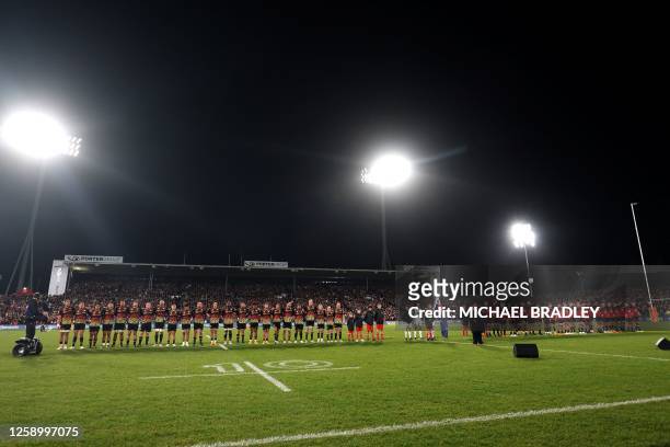 Teams, Chiefs and Crusaders , listen national anthem ahead of the Super Rugby Pacific final match between the Chiefs and Crusaders at FMG Stadium in...
