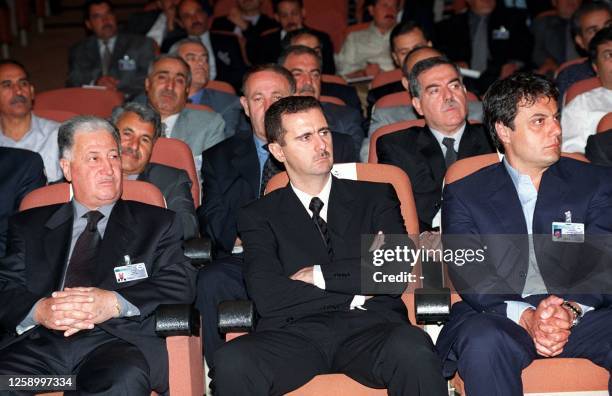 Bashar al-Assad , the expected successor to his late father Hafez al-Assad, sits among Baath party members during intensive debates on policy making...