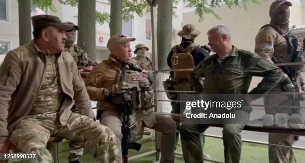 Screen grab captured from a video shows Wagner chief Yevgeny Prigozhin after Headquarters of the Southern Military District surrounded by fighters of...