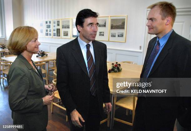 Danish Liberal Party leader Anders Fogh Rasmussen meets with members of the right-wing Danish People's Party, leader Pia Kjaersgaard and Peter...