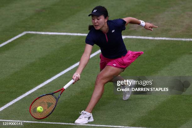 China's Lin Zhu returns to Czech Republic's Barbora Krejcikova during their women's singles semi-final tennis match at the Rothesay WTA Birmingham...