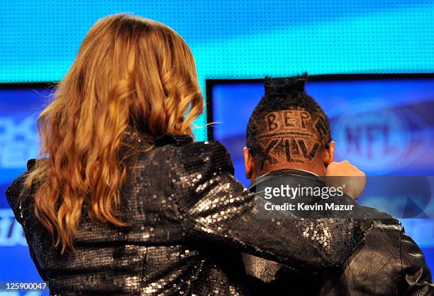 Fergie and apl.de.ap of the Black Eyed Peas speak at the Bridgestone Super Bowl XLV Halftime Show press conference on February 3, 2011 in Dallas,...