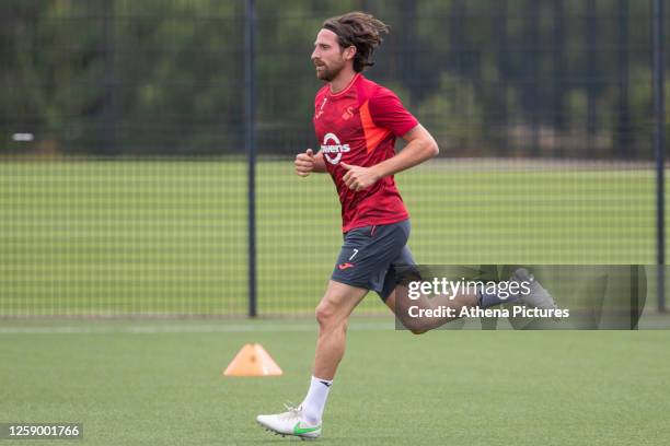 Joe Allen runs during the Swansea City AFC Training Sessionat The Fairwood Training Ground on June 23, 2023 in Swansea, Wales.