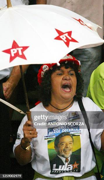 Supporter of the leftist Workers Party shouts slogans while participating in a march under the rain, 01 October 2002, in San Bernardo do Campo, a 50...