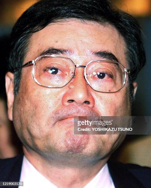 Picture dated 20 November 2002 shos Koichi Kato, former ruling LDP Secretary General biting his lips during a press conference at a Tokyo hotel....