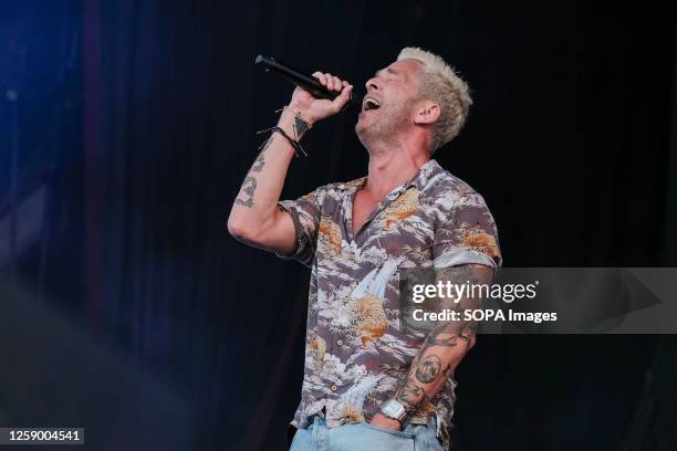 Ryan Tedder, lead singer and guitarist with American indie alternative pop rock band OneRepublic performs live on stage at the Isle of Wight...