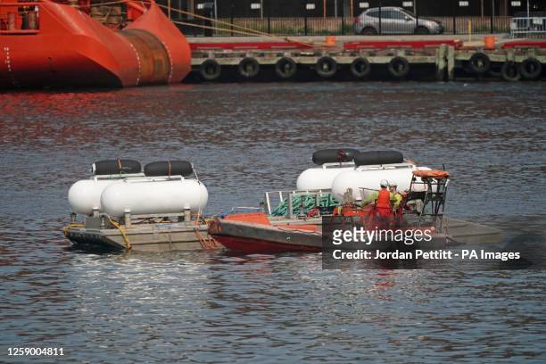 The launch platform used for the Titan submersible, is towed at the Port of St. John's in Newfoundland, Canada. Paul-Henri Nargeolet, Hamish Harding,...