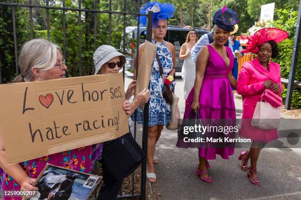 Animal rights campaigners protest outside Ascot racecourse as racegoers arrive for the fifth day of Royal Ascot on 24 June 2023 in Ascot, United...