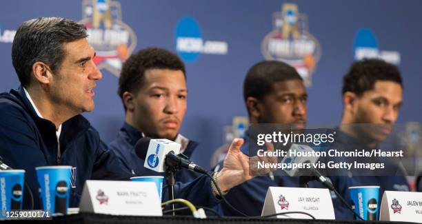 Villanova head coach Jay Wright, left, speaks to the media during a news conference before the NCAA basketball championship at NRG Stadium on Sunday,...