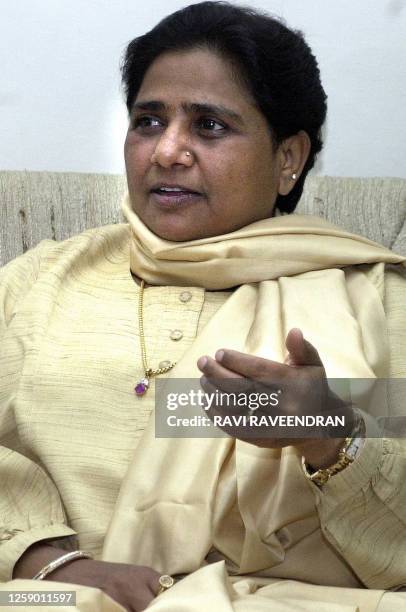 Uttar Pradesh Chief Minister Mayawati gestures as she speaks to the press in New Delhi, 11 March 2003. Mayawati, who is in New Delhi to finalise her...