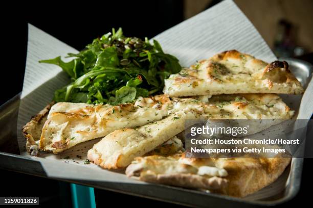 Barney's with arugula is shown at Pi Pizza on Thursday, Oct. 20 in Houston.