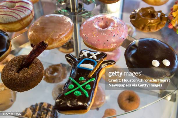 The signature voodoo doll doughnut is shown at Voodoo Doughnut on Tuesday, Jan. 7 in Houston. Voodoo Doughnut opens his first Houston store on Jan....