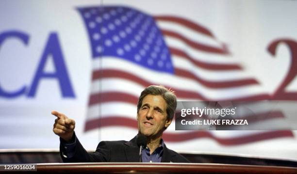 Democratic presidential candidate John Kerry rehearses on the main podium of the Democratic National Convention 29 July 2004, in Boston,...