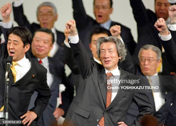 Japanese Prime Minister Junichiro Koizumi along with candidates for the upcoming Upper House election and his party's Secretary General Shinzo Abe ,...